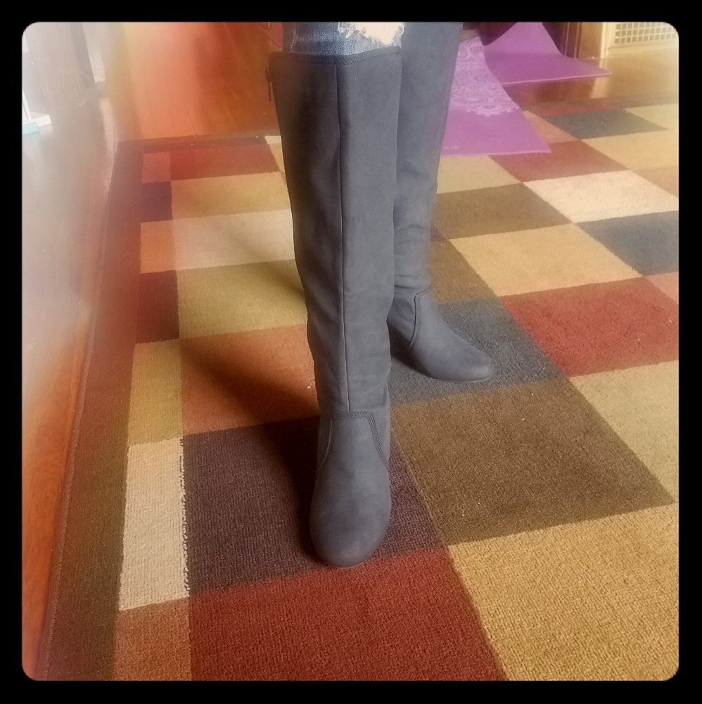 Denim blue, suede, knee-high boots.